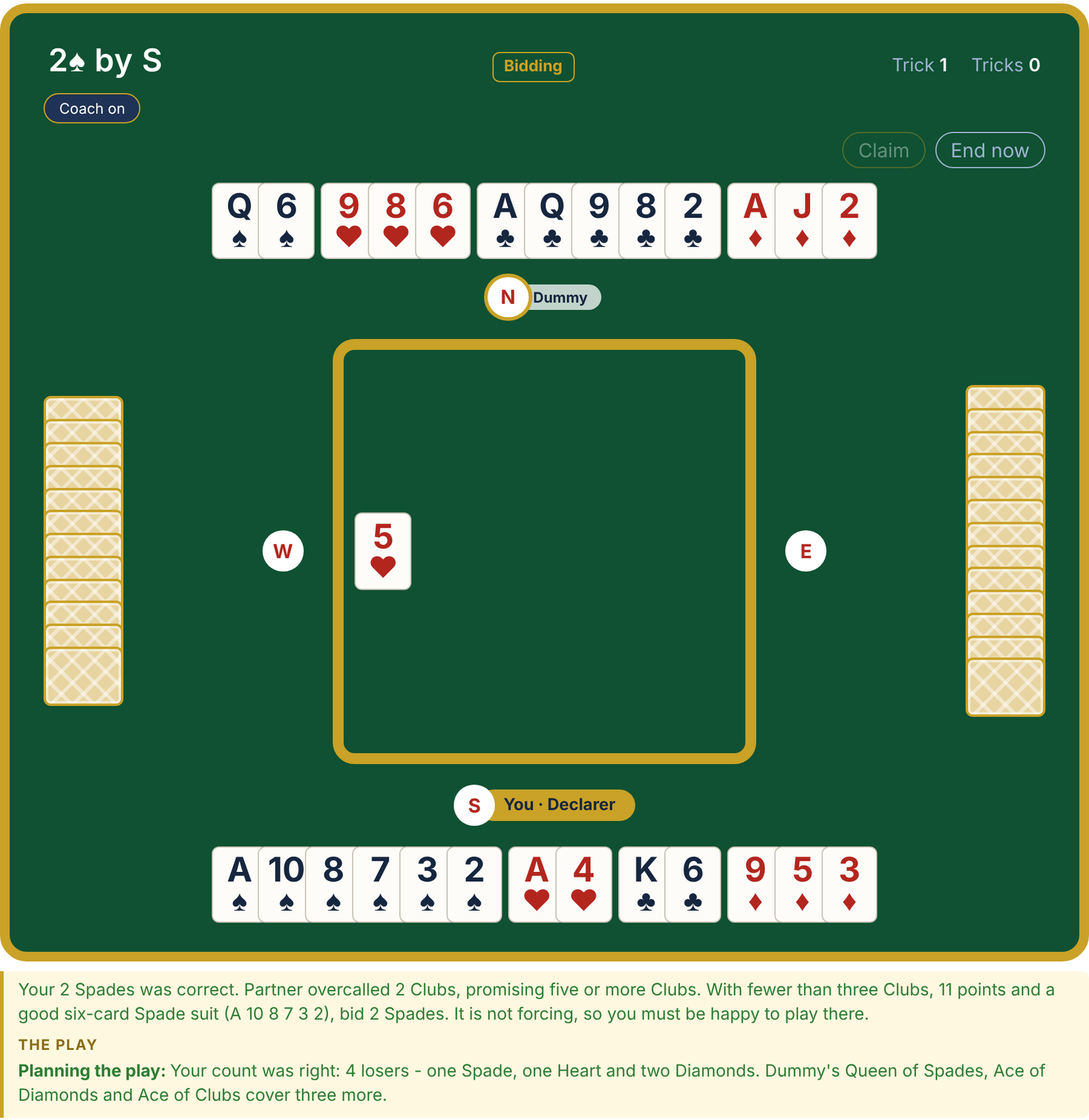 The Convention Centre: a hand in play, with the coach checking the bidding and the player's plan at trick one